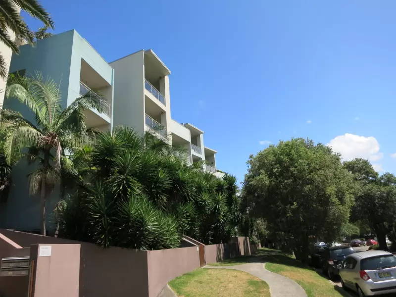 Residential building on a tree-lined street in Sydney